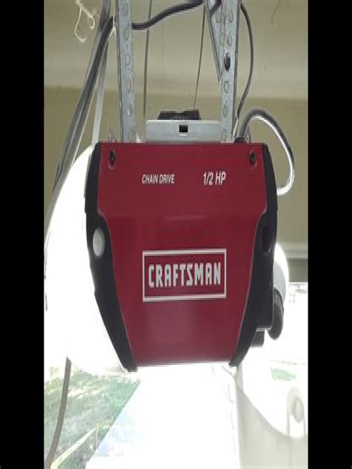 How do I adjust my Craftsman garage door opener?
